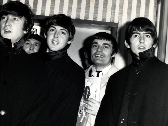 Members of band ‘The Beatles’ (L-R) John Lennon, Paul McCartney, Jimmy Nicol (filling in for ringo Starr who was sick) and George Harrison during their tour of Australia in a 1964 photo. Picture: News Corp
