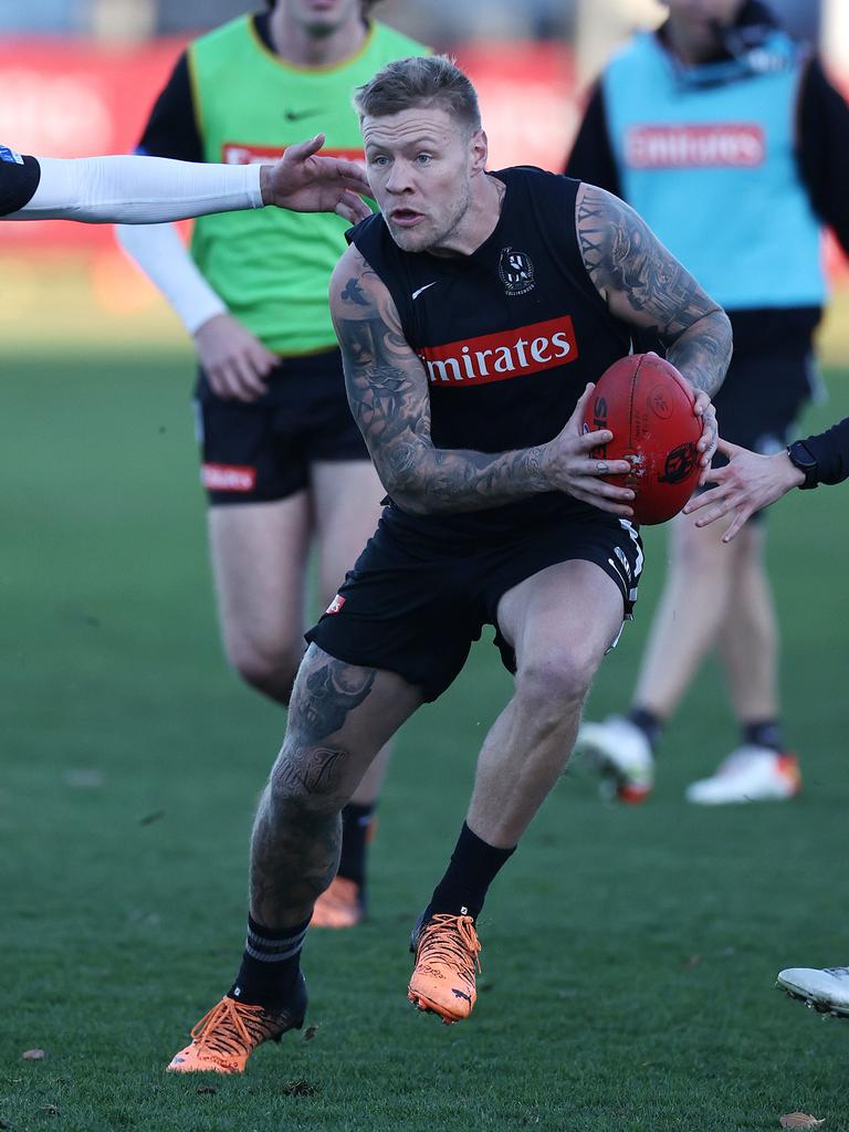 Jordan De Goey evades teammates at training. Picture: Michael Klein