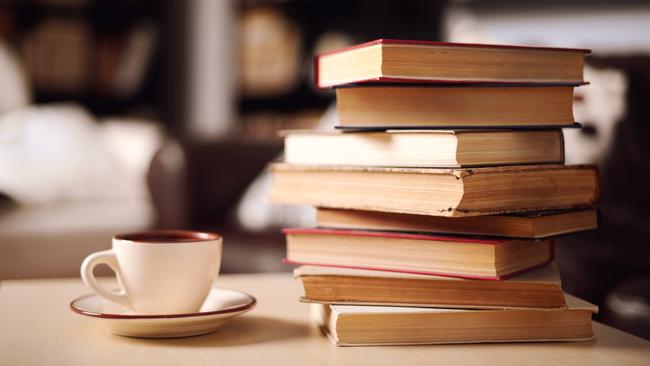 stack of books in home interior