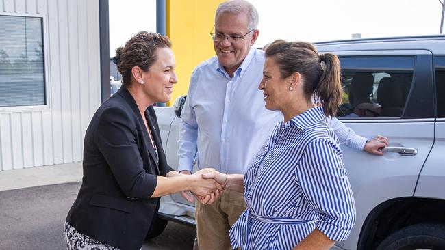 Scott and Jenny Morrison are welcomed to CareFlight’s Darwin hangar. Picture: Jason Edwards