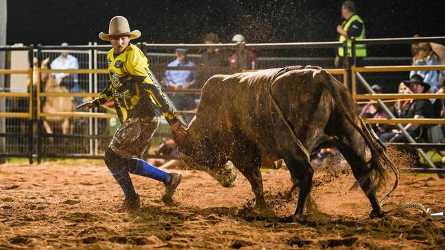 Rodeo protection athlete Harley Schofield says he steps in front of bulls weighing more than half a tonne because it is his passion. Picture: Redhot Photography