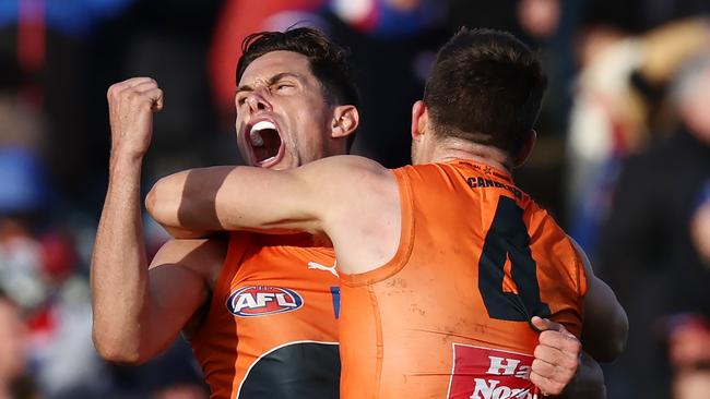 Josh Kelly and Toby Greene celebrate on the final siren. Picture: Michael Klein