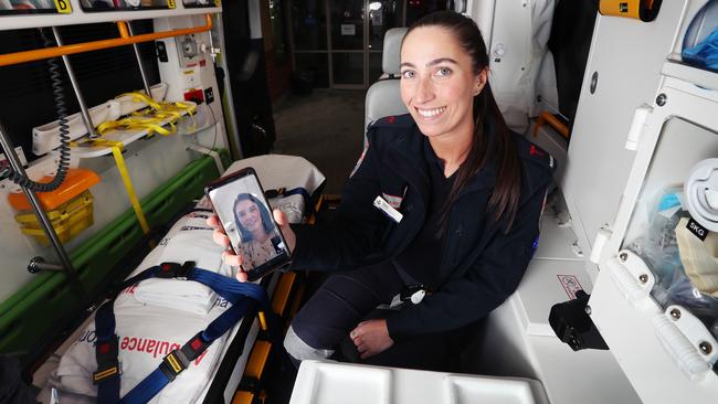 Paramedic Stephanie Vassett on a virtual call to nurse Hayley. Picture: Rebecca Michael