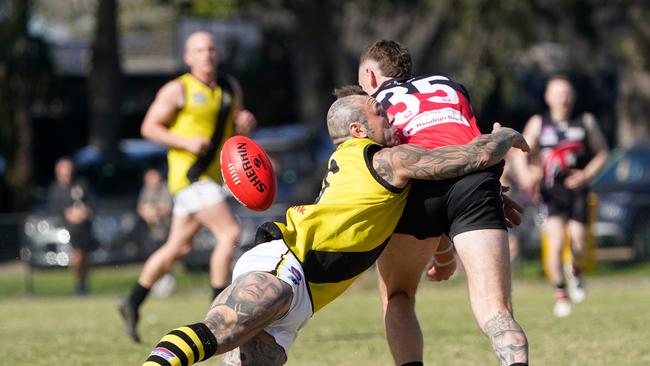 Ryan Gillis tackles Wade De la haye. Picture: Valeriu Campan