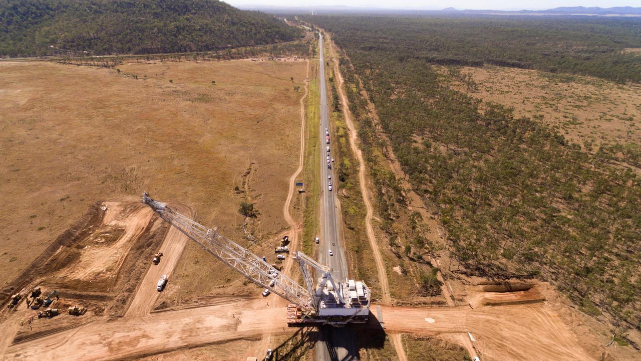 BHP dragline move to South Walker Creek. The dragline crossed the Peak Downs Highway about 8.5km west of the town of Coppabella. Coal