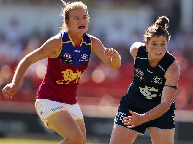 AFLW. Carlton v Brisbane Lions at Ikon Park, Carlton . Bella Ayre and her opponent chase the loose footy .Pic : Michael Klein