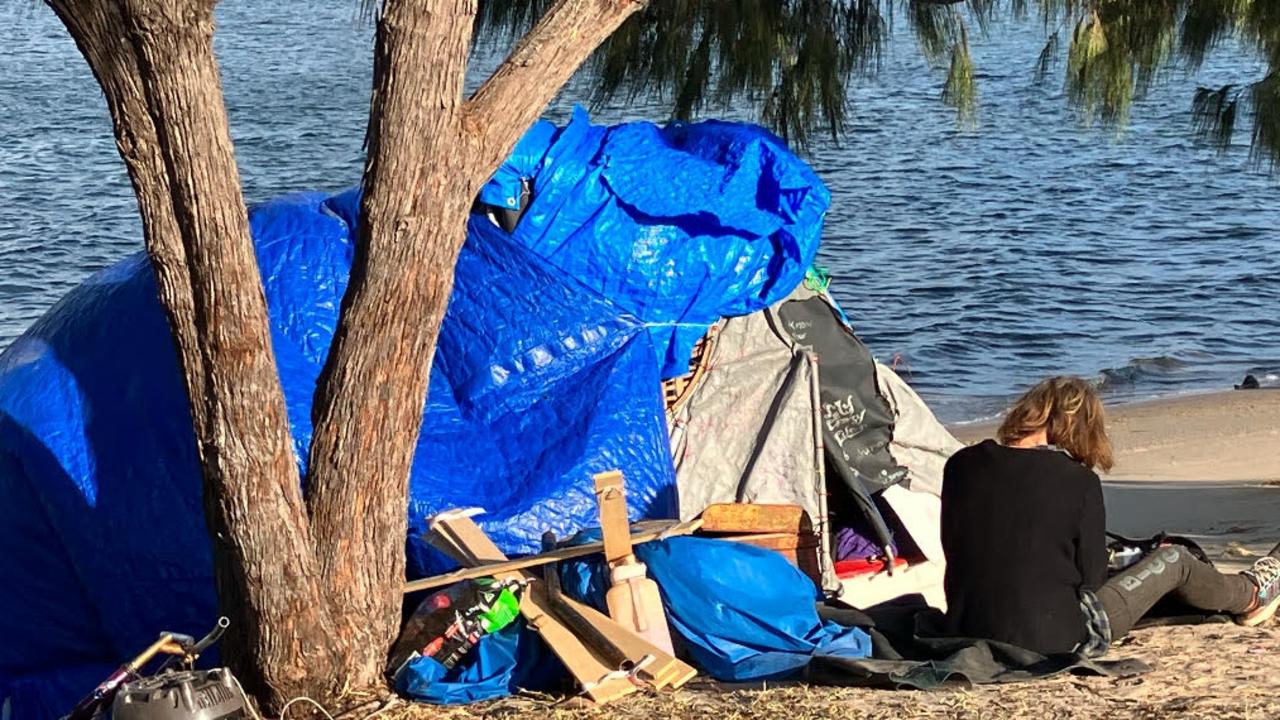 The homeless camp and boat at James Overell Park in Southport, on the Nerang River.