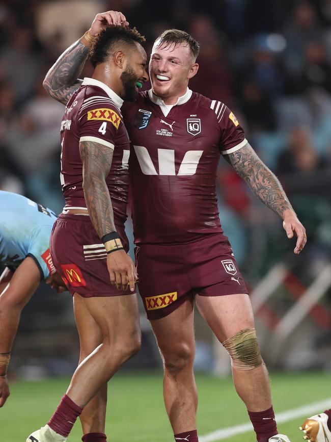 Hamiso Tabuai-Fidow (L) of the Maroons celebrates with J'maine Hopgood of the Maroons after scoring his third try during game one of the 2024 Men's State of Origin Series between New South Wales Blues and Queensland Maroons at Accor Stadium on June 05, 2024 in Sydney, Australia. (Photo by Matt King/Getty Images)