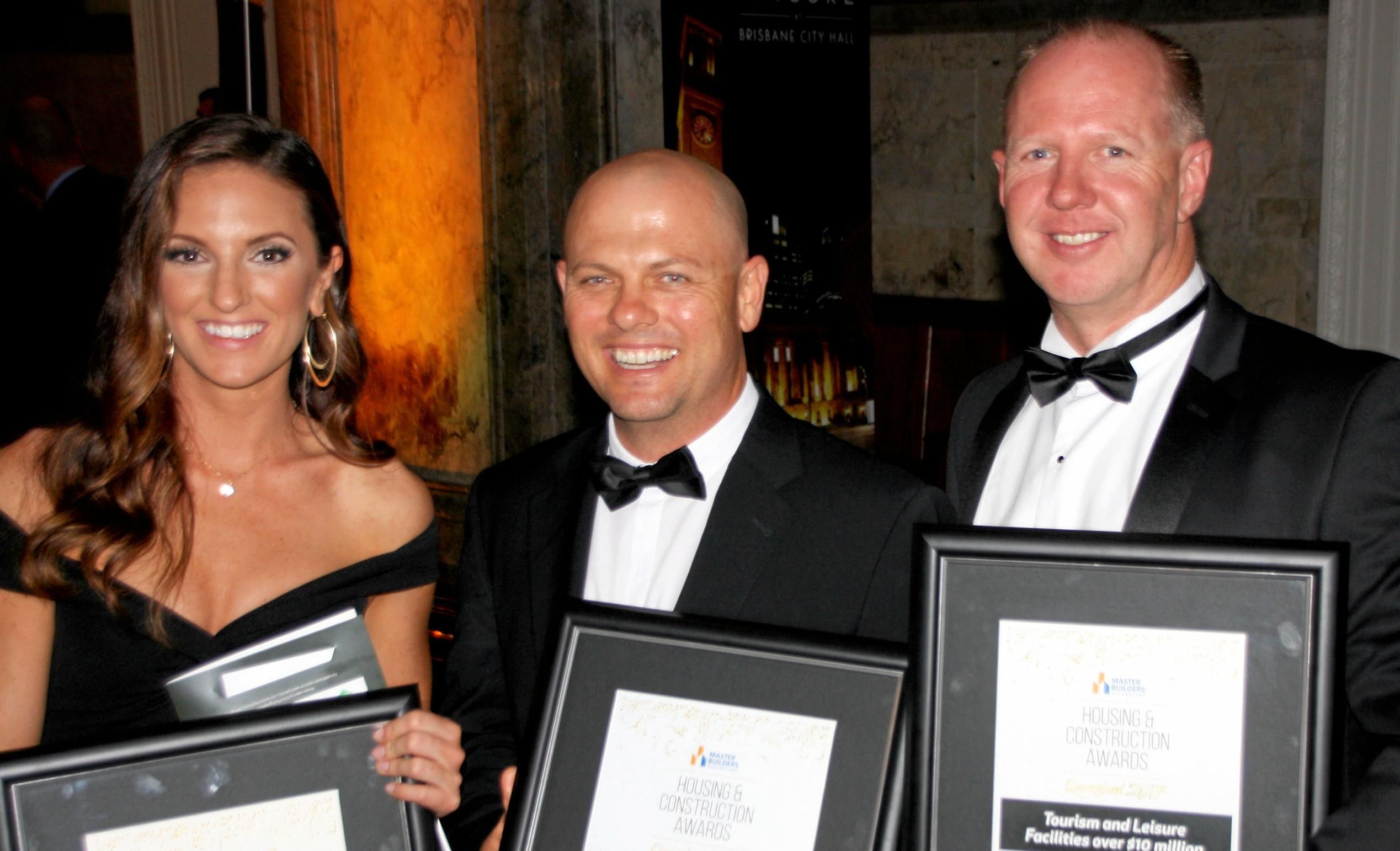 Emma Dunn, Steve Hodgins and Michael Michell of Hutchinson Builders at the 2017 Master Builders Queensland Housing and Construction Awards at Brisbane City Hall. Picture: Erle Levey