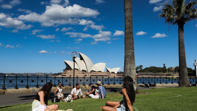 New South Wales will reopen to the fully vaccinated on Monday October 11. Sydneysiders are seen by the harbour on October 4. Picture: NCA NewsWire / Gaye Gerard