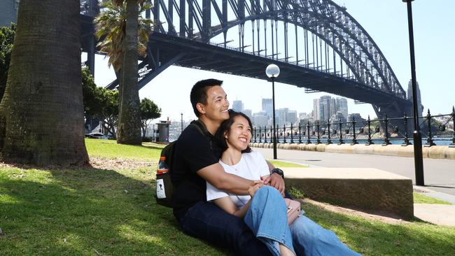 Chinese tourists Tom Lu and Lincy Cen soaking up the sun in Sydney. John Feder