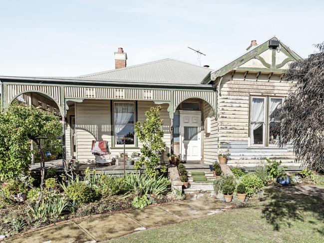 The former Cats player alleges the abuse occurred while he lived at this Newtown football house for country recruits.