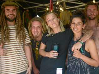 BLOOMING GOOD: John Lenon of Yilgar Designs from Sydney with backpackers Soul, Jess Dowlman Tom Back and Dani Affleck. Picture: Jann Houley