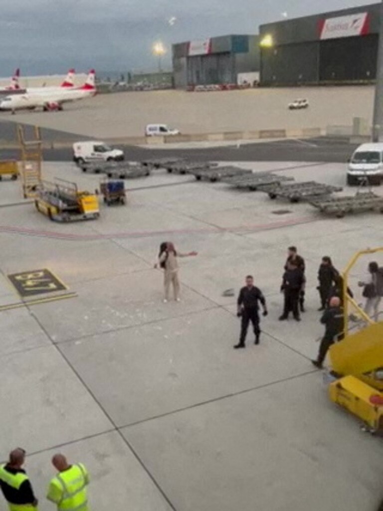 A woman was said to have thrown almost $10,000 in cash on the runway. Picture: SWNS / MEGA