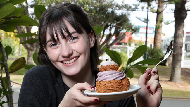 Bella Ryan with a Bam Bam Bakehouse treat. Photo by Richard Gosling