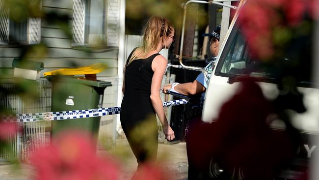 Police talk to residents at the scene in Wickham, Newcastle, where Parry was shot dead. Picture: Peter Lorimer.