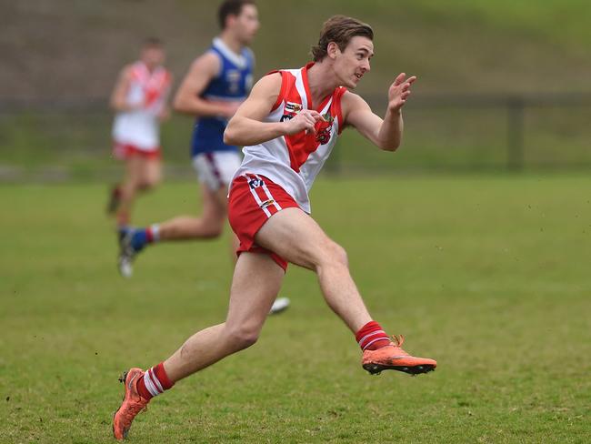 Jackson Matthews boots Karingal into attack against Mornington. Picture: Chris Eastman