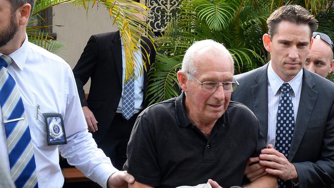 Former Police officer Roger Rogerson is taken into custody.