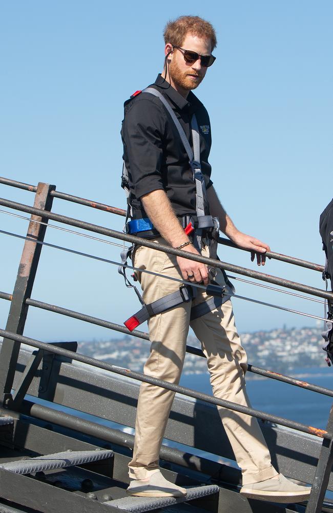 Britain's Prince Harry, Australia's Prime Minister Scott Morrison and Invictus Games representatives climb the Sydney Harbour Bridge in Sydney, Friday, October 19, 2018. Picture: AP