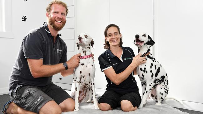 ANIMAL PHYSIO: Brooke Williams is a leading animal physio and has moved her practice to Nambour. She treats up to 17 dogs a day. Pictured with Brooke is client Nathan Owens with his dogs, Huxley and Cinnamon. Picture: Patrick Woods