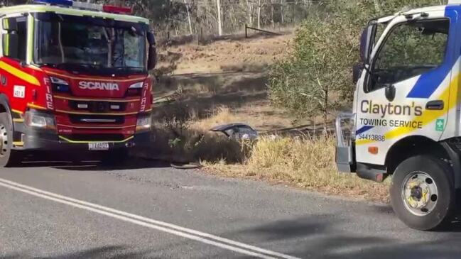 Driver trapped after car rolls over embankment in Corella