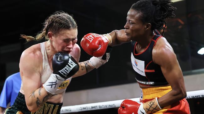 Millicent Agboegbulen throws one of many punches that caught Harris. (Photo by Mark Evans/Getty Images)