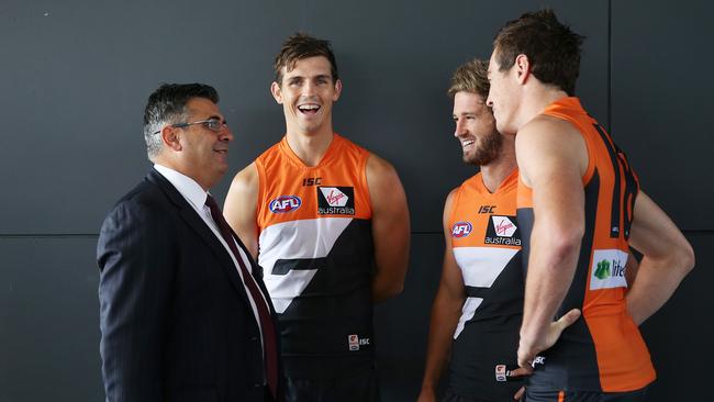 AFL CEO Andrew Demetriou with GWS Giants players Phil Davis, Callan Ward and Jeremy Cameron pic. Phil Hillyard