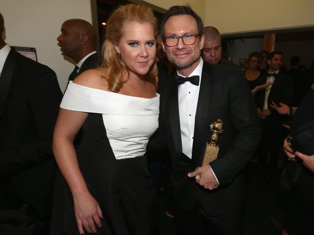 BEVERLY HILLS, CA - JANUARY 10: 73rd ANNUAL GOLDEN GLOBE AWARDS -- Pictured: (l-r) Actors Amy Schumer and Christian Slater attend NBCUniversal’s Golden Globes Post-Party Sponsored by Chrysler held at the Beverly Hilton Hotel on January 10, 2016. (Photo by Christopher Polk/NBC/NBCU Photo Bank via Getty Images)