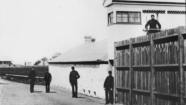 Warders pose outside the St Helena Island prison, at the mouth of the Brisbane River, in 1893. Picture: State Library of Queensland