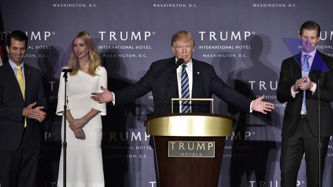 Donald Trump, with children (L-R) Donald Trump Jr., Ivanka Trump, and Eric Trump, during the grand opening of the Trump International Hotel in Washington. Picture: Getty Images.