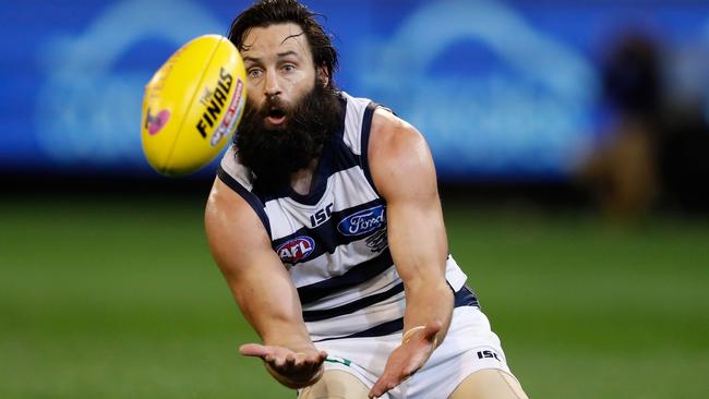 Jimmy Bartel takes a mark against Hawthorn.