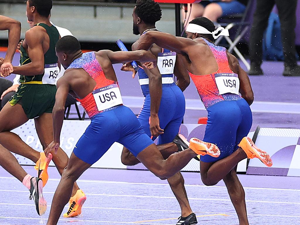 USA’s Christian Coleman attempts to pass the baton to team mate Kenneth Bednarek (R). Picture: Patrick Smith/Getty Images