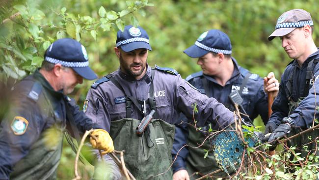 Police spent days scouring bushland and neighbouring houses to no avail. Picture:Peter Lorimer.