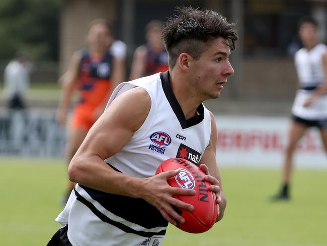 Cooper Barbera of the Knights chases the ball during the NAB League football match between the Northern Knights and the GWS Academy played at Trevor Barker Oval in Sandringham on Saturday 13th April, 2019.