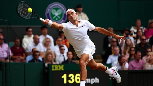 Federer plays a forehand in a quarter final match against Milos Raonic of Canada, 2017. Picture: Clive Brunskill/Getty Images