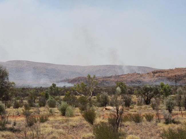 A bushfire burning west of Alice Springs has shut sections of the Larapinta Trail on the West MacDonnell Ranges, as well as Standley Chasm, with no reopening date set as of February 1, 2025. Picture: Gera Kazakov