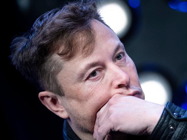 (FILES) In this file photo Elon Musk, founder of SpaceX, listens to a question during the Satellite 2020 at the Washington Convention Center March 9, 2020, in Washington, DC. - Tesla chief Elon Musk on April 29 called the coronavirus confinement a "fascist" action and "an outrage" that infringes on personal freedom and will damage the economy. (Photo by Brendan Smialowski / AFP)