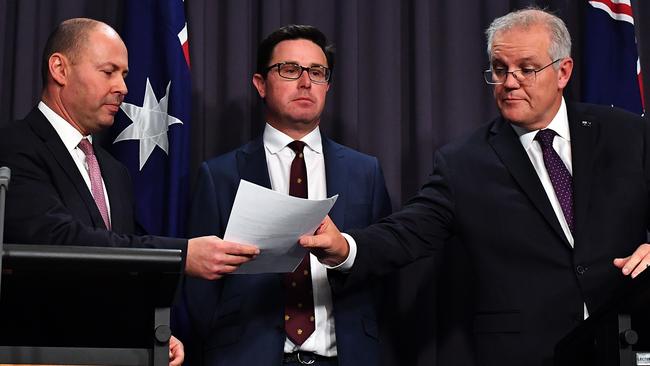 Treasurer Josh Frydenberg, left, Agriculture Minister David Littleproud and Scott Morrison in Canberra on Thursday. Picture: Getty Images