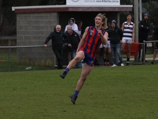 Tom Hughes kicks the match winner for Rye against Chelsea last month. Picture: Rye FNC