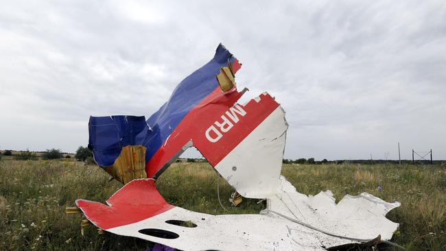 A piece of wreckage of the Malaysia Airlines flight MH17 pictured in Shaktarsk, the day after it crashed.                         MH17 Shot Down by Buk Missile 'From Russia,' Investigators Say