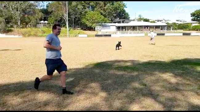 Alex and his father with his dog Barney in June 2022