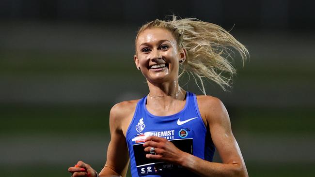 SYDNEY, AUSTRALIA - MARCH 11: Jessica Hull of Australia celebrates winning the Women's 3000m Final during the 2023 Sydney Track Classic at Sydney Olympic Park Athletic Centre on March 11, 2023 in Sydney, Australia. (Photo by Brendon Thorne/Getty Images)