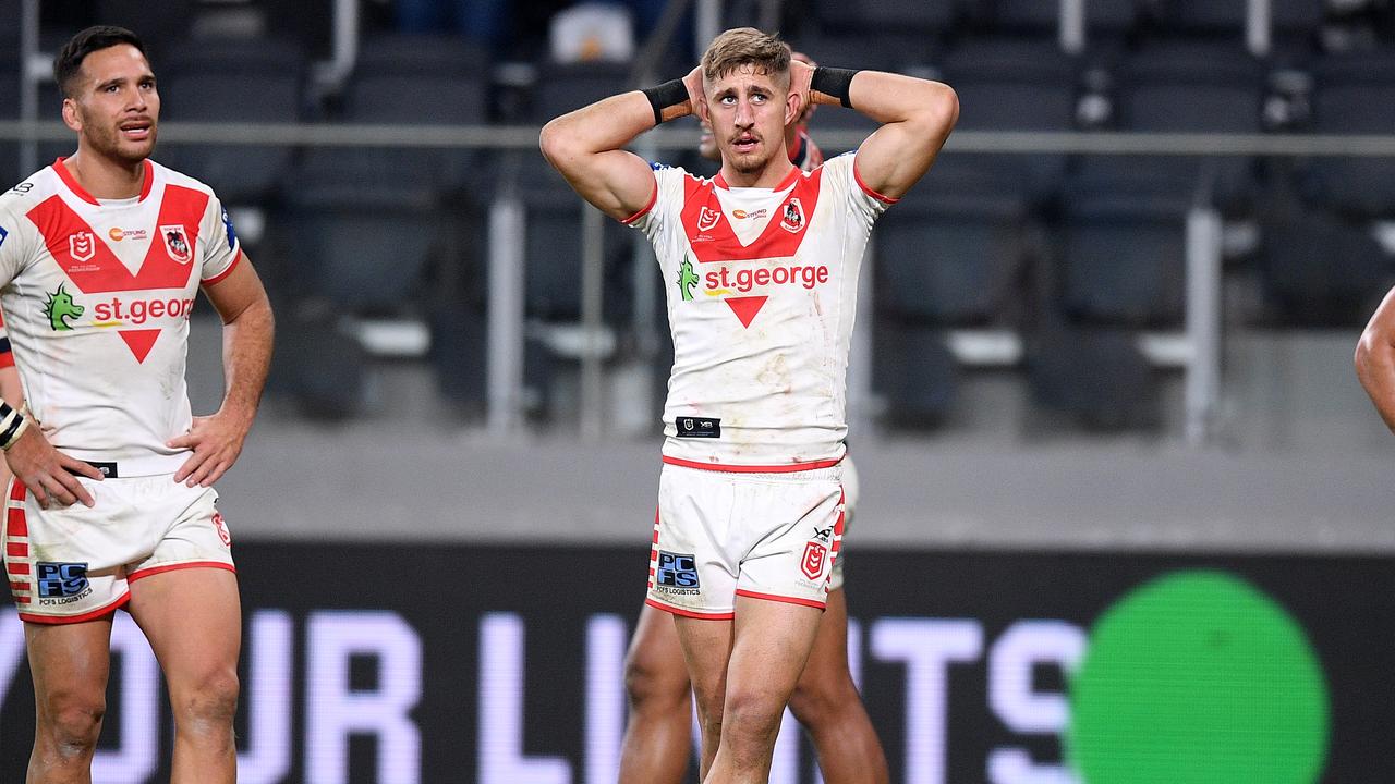 Corey Norman, Zac Lomax and Tyson Frizell of the Dragons react after conceding a try during the Round 7 NRL match between the Sydney Roosters and the St George Illawarra Dragons at Bankwest Stadium in Sydney, Friday, June 26, 2020. (AAP Image/Dan Himbrechts) NO ARCHIVING, EDITORIAL USE ONLY