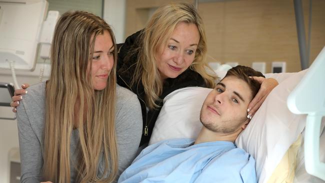 Sturt footballer Blake Kennedy, who has kidney and lung damage, with sister Amy and mother Michele in hospital. Picture: Dean Martin