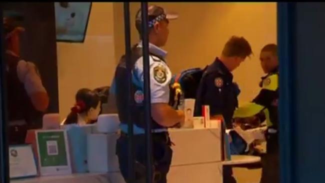 Police investigate after a woman goes into cardiac arrest at a Chippendale beauty clinic yesterday. Picture: Ten News