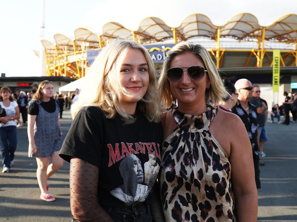 Mckenzie Curry and mum Angela arrive at Metricon Stadium to see Queen Live. Photograph: Jason O'Brien