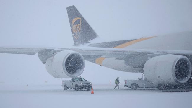 A United Parcel Service, Inc. (UPS) Boeing 747 cargo jet sits parked in the snow at Louisville Muhammad Ali International Airport on January 5, 2025 in Louisville, Kentucky. Picture: Getty Images via AFP