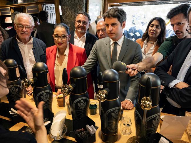 France's Prime Minister Gabriel Attal meets a mustard retailer during a campaign visit in Dijon, eastern France, on June 24. Picture: Arnaud Finistre/AFP