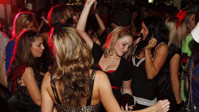 Generic party scene of mainly women raging on the dancefloor at Lady Lux nightclub, Kings Cross in Sydney.