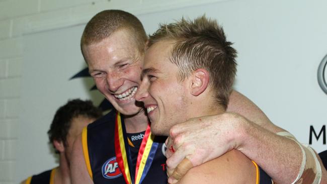 Sam Jacobs celebrates one of his Showdown medals with Bernie Vince.